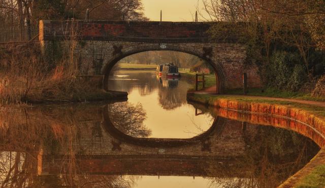 Canal bridge in low sun. 